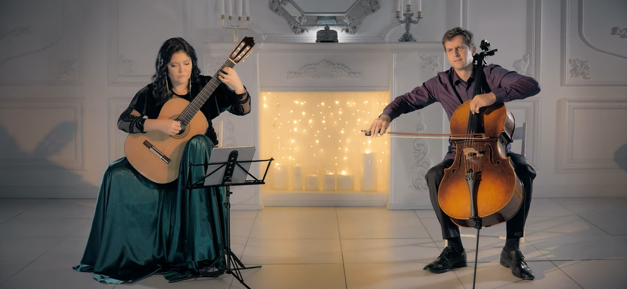 Load video: Link to video of Irina Kulikova and Feliks Volozhanin playing Albinoni&#39;s Adagio for guitar and cello